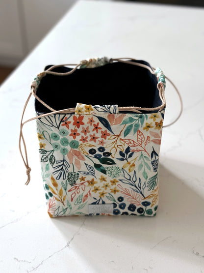 The Pat Pouch - Japanese Drawstring Bag in Colorful Floral Canvas and Navy Waxed Canvas Lining - KrisChris 