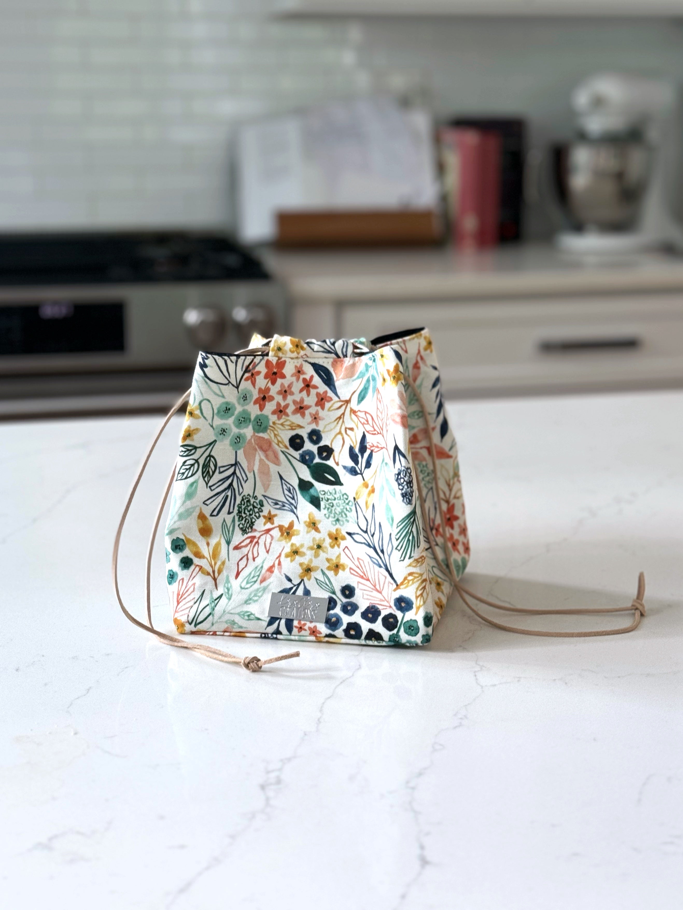 The Pat Pouch - Japanese Drawstring Bag in Colorful Floral Canvas and Navy Waxed Canvas Lining - KrisChris 