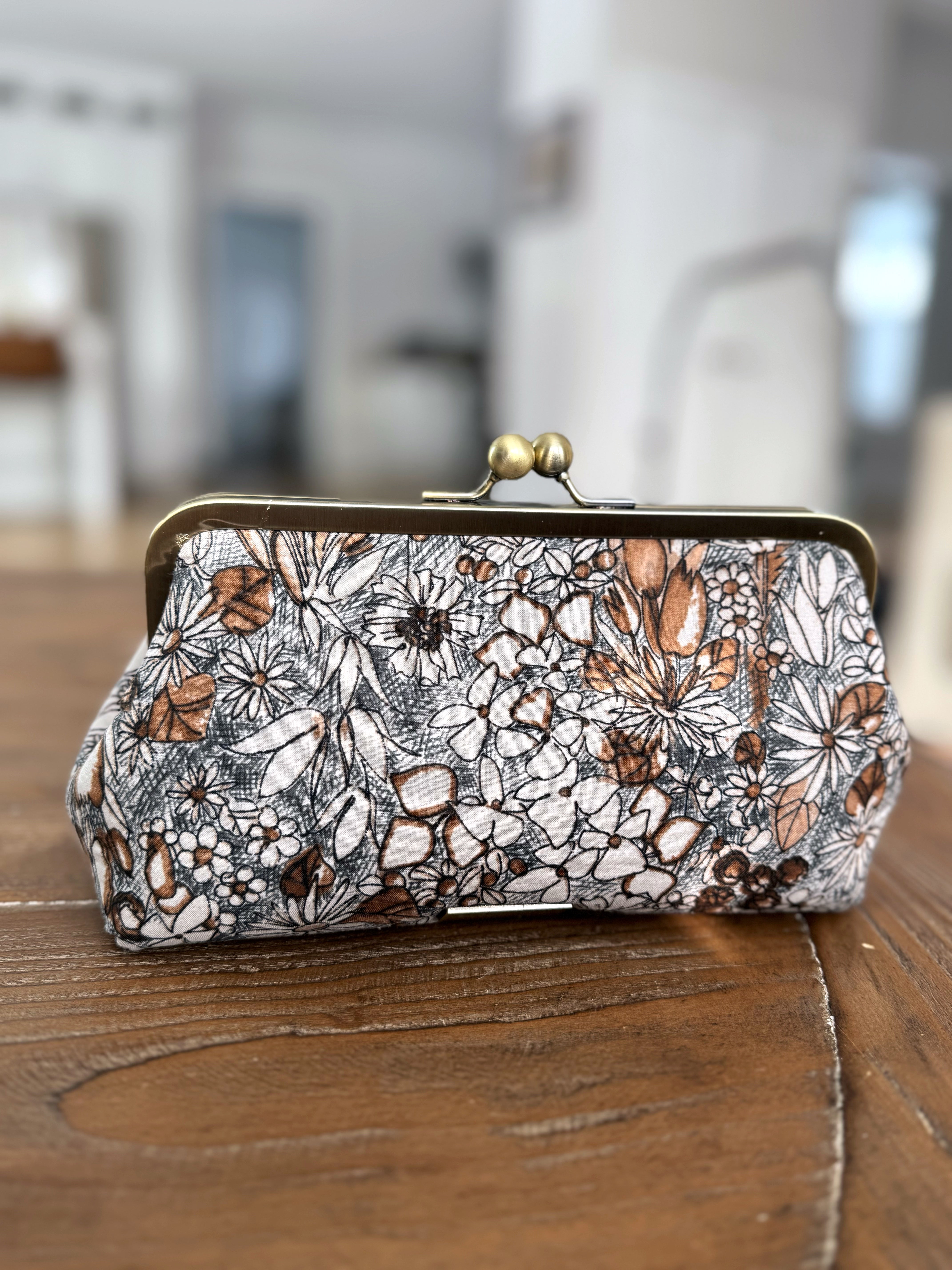 The Elise - Metal Frame Kisslock Clutch in Japanese Illustrated Florals and Waxed Canvas Lining