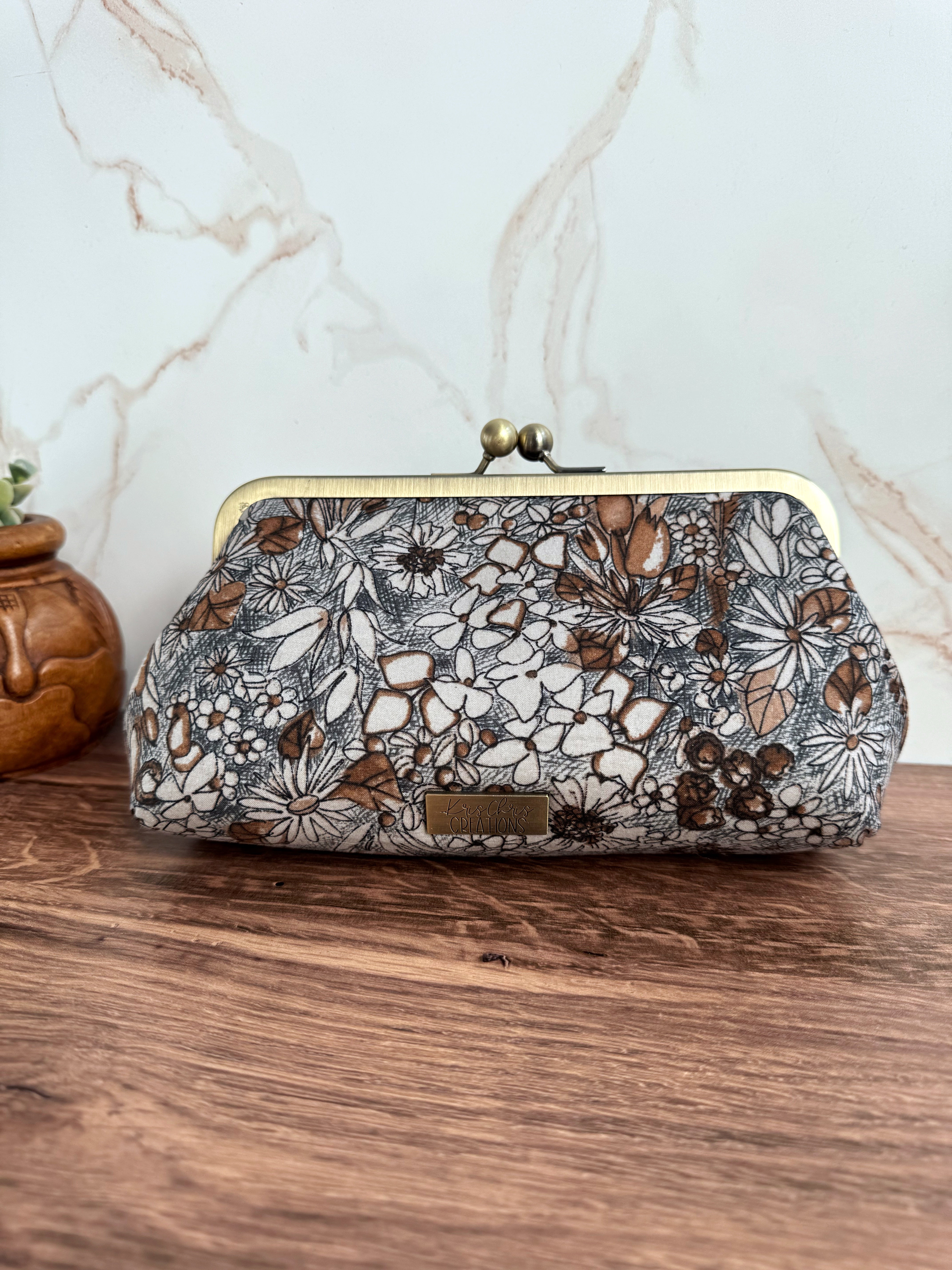 The Elise - Metal Frame Kisslock Clutch in Japanese Illustrated Florals and Waxed Canvas Lining