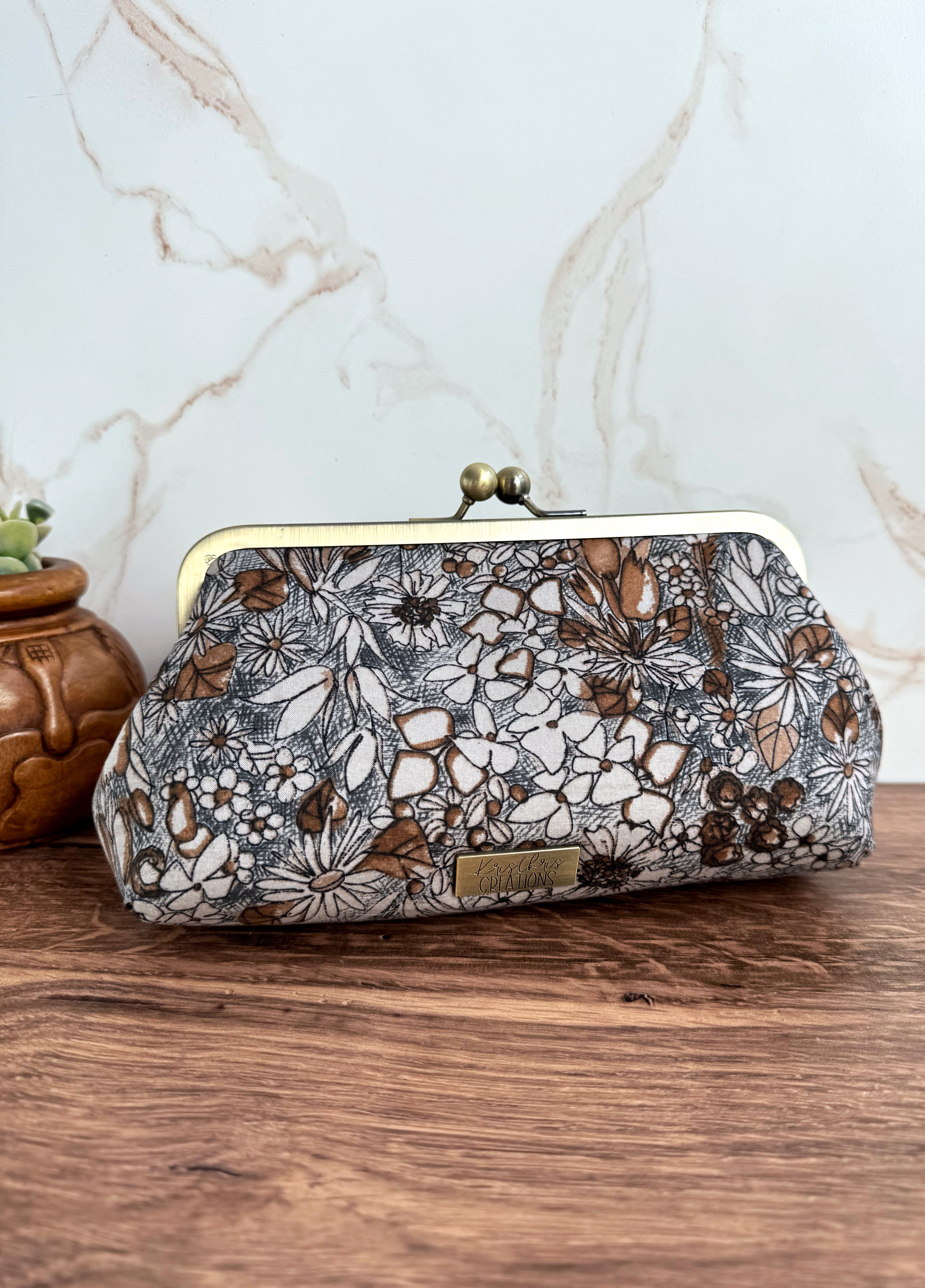 The Elise - Metal Frame Kisslock Clutch in Japanese Illustrated Florals and Waxed Canvas Lining