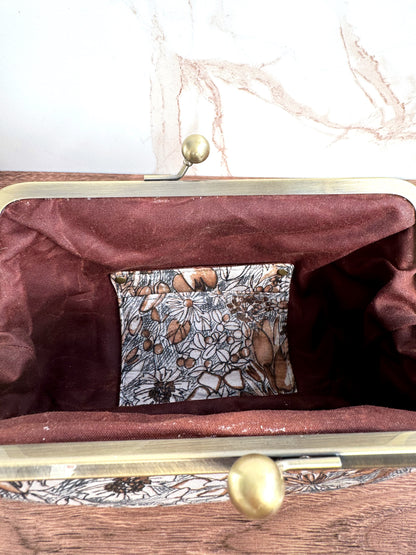 The Elise - Metal Frame Kisslock Clutch in Japanese Illustrated Florals and Waxed Canvas Lining