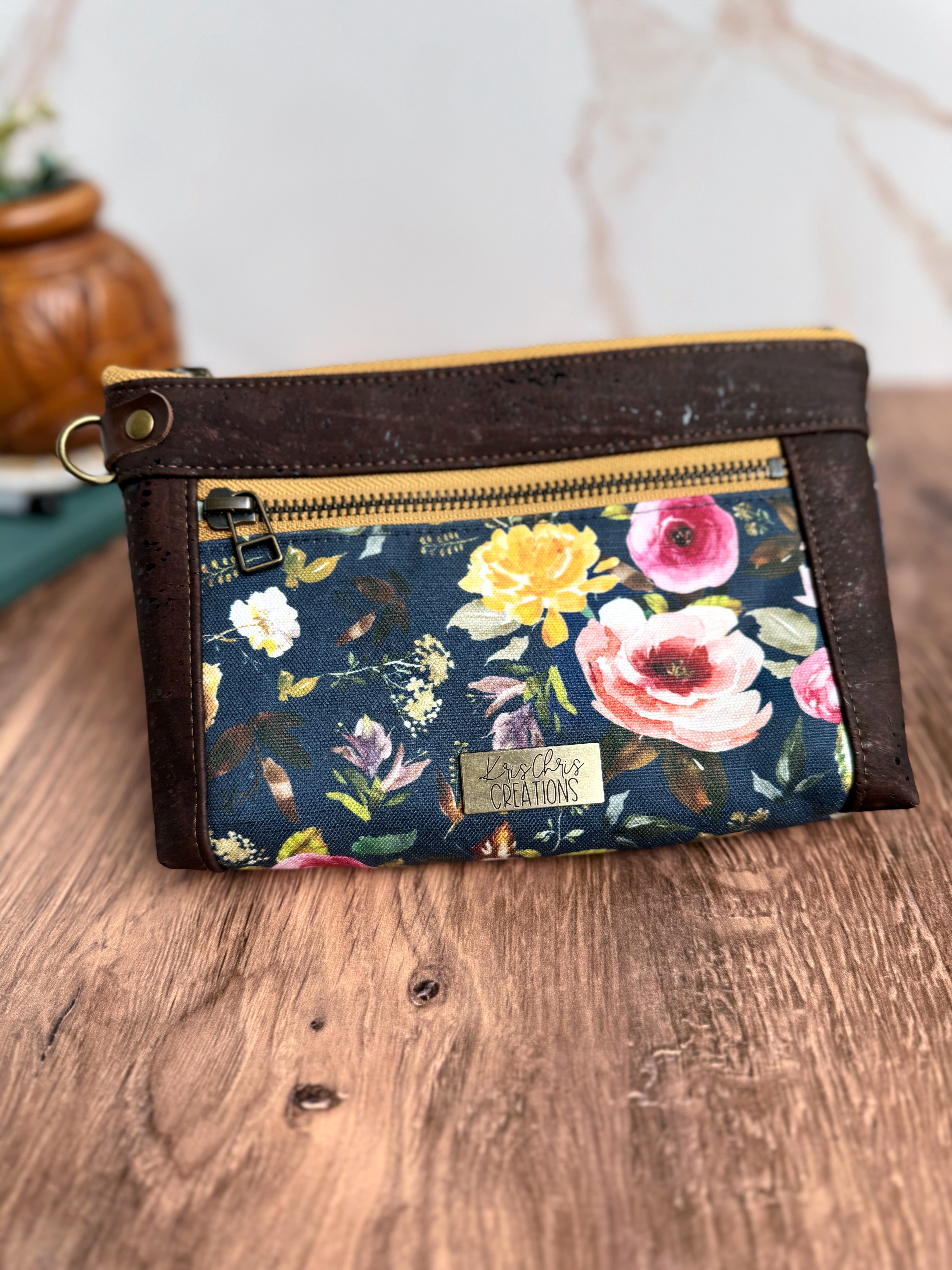 Floral pouch on wooden base and marble background